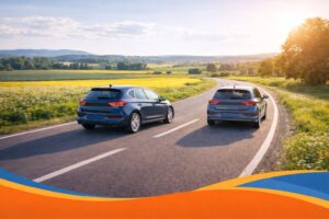 Twee auto's op een rustige weg tijdens een zonnige dag, ideaal voor het vergelijken van Allsecur autoverzekeringen.